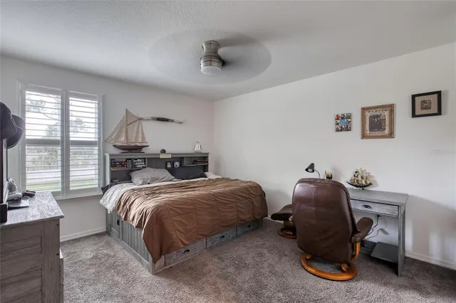 a view of a hallway with a livingroom