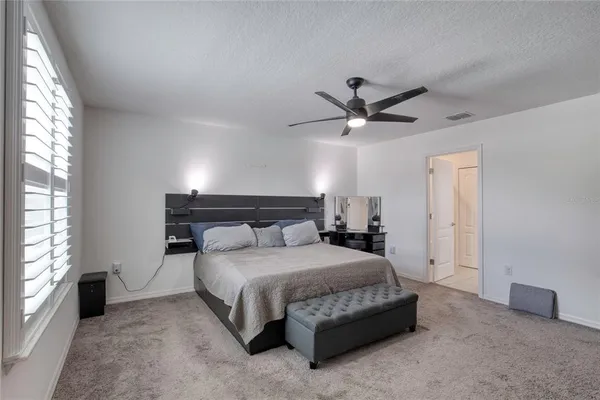 a view of a park with swings and slides