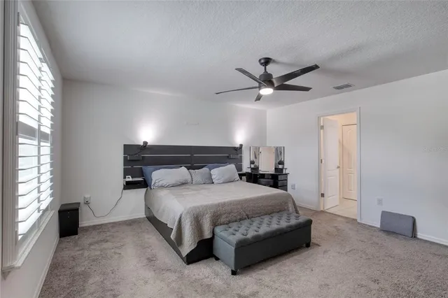 a view of a park with swings and slides