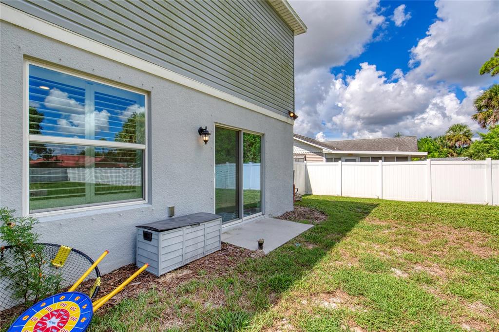 276 Farmbrook Road Port Orange, FL 32127 - Photo 44 of 62 a view of an house with backyard and sitting area