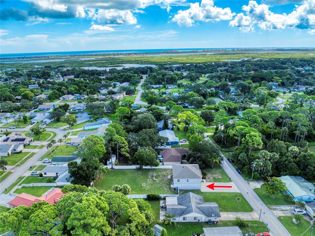 276 Farmbrook Road Port Orange, FL 32127 - Photo 57 of 62 a view of yard with seating area and green space