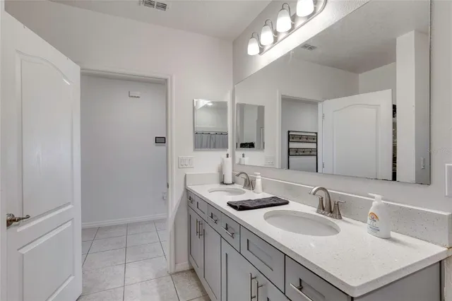 a living room with furniture a table and chairs