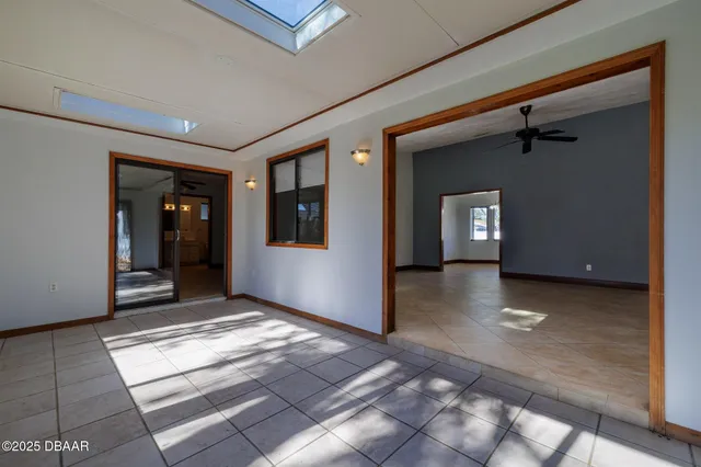 a view of an empty room and window