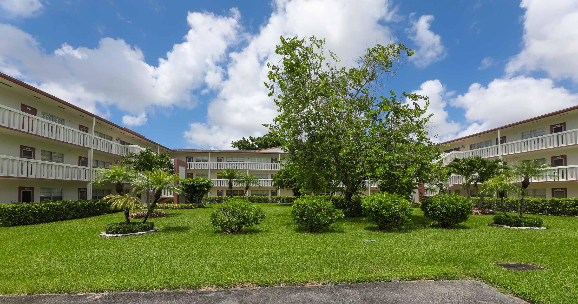 402 Fanshaw J Boca Raton, FL 33434 - Photo 2 of 18 Front of Building