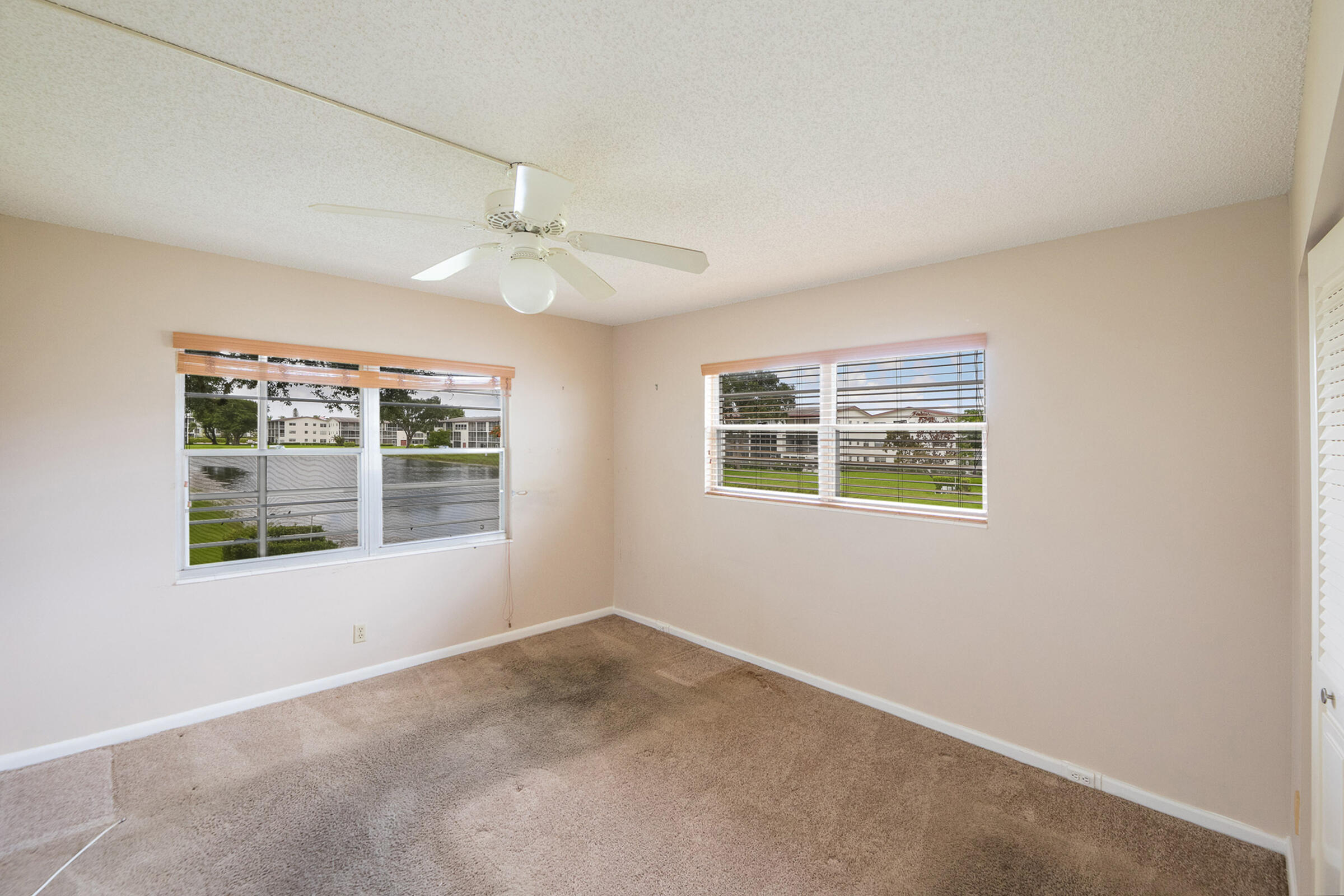 402 Fanshaw J Boca Raton, FL 33434 - Photo 10 of 18 Primary Bedroom