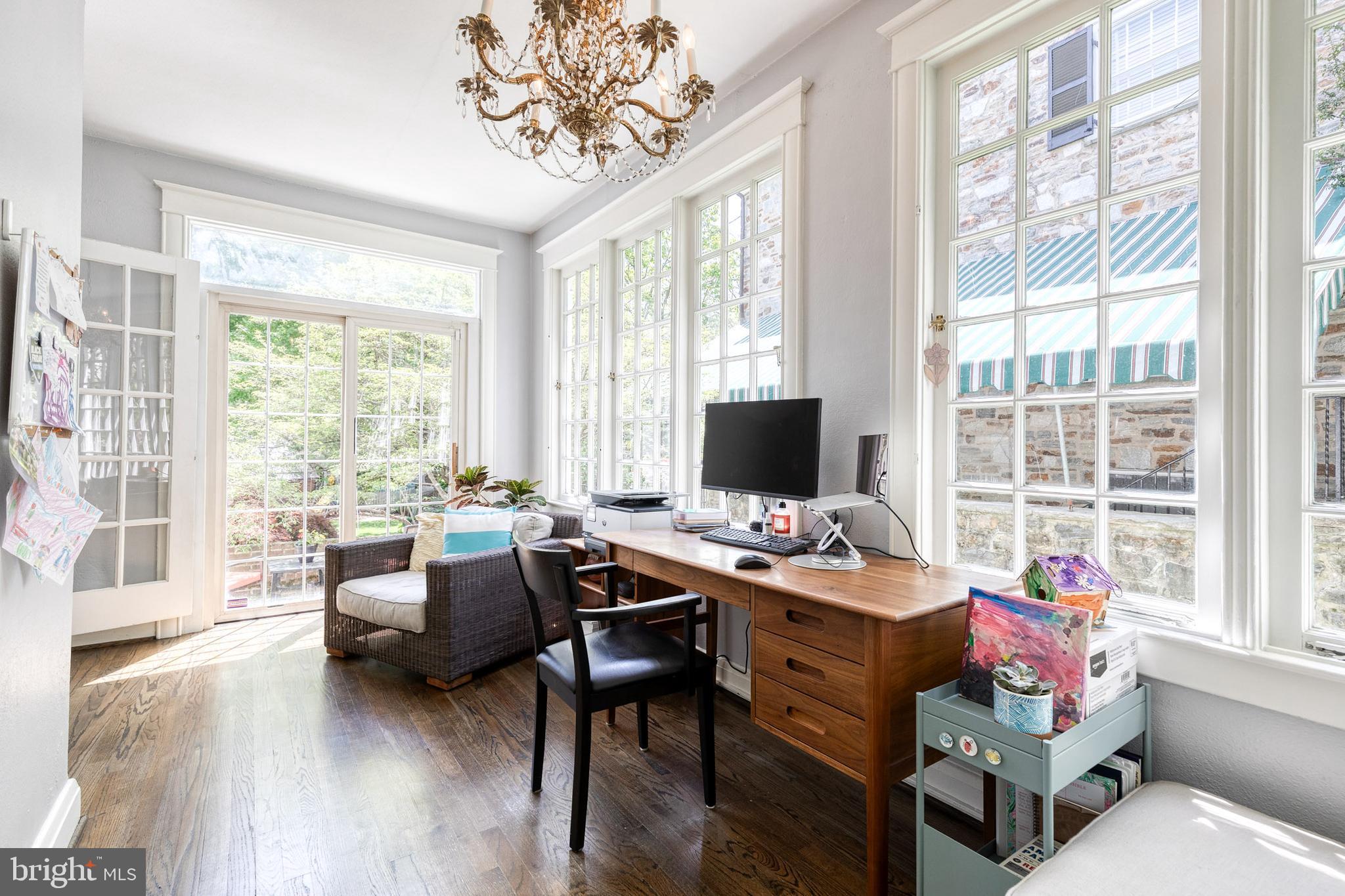 225 Tunbridge Road Baltimore, MD 21212 - Photo 22 of 65 a view of a livingroom with workspace and a window