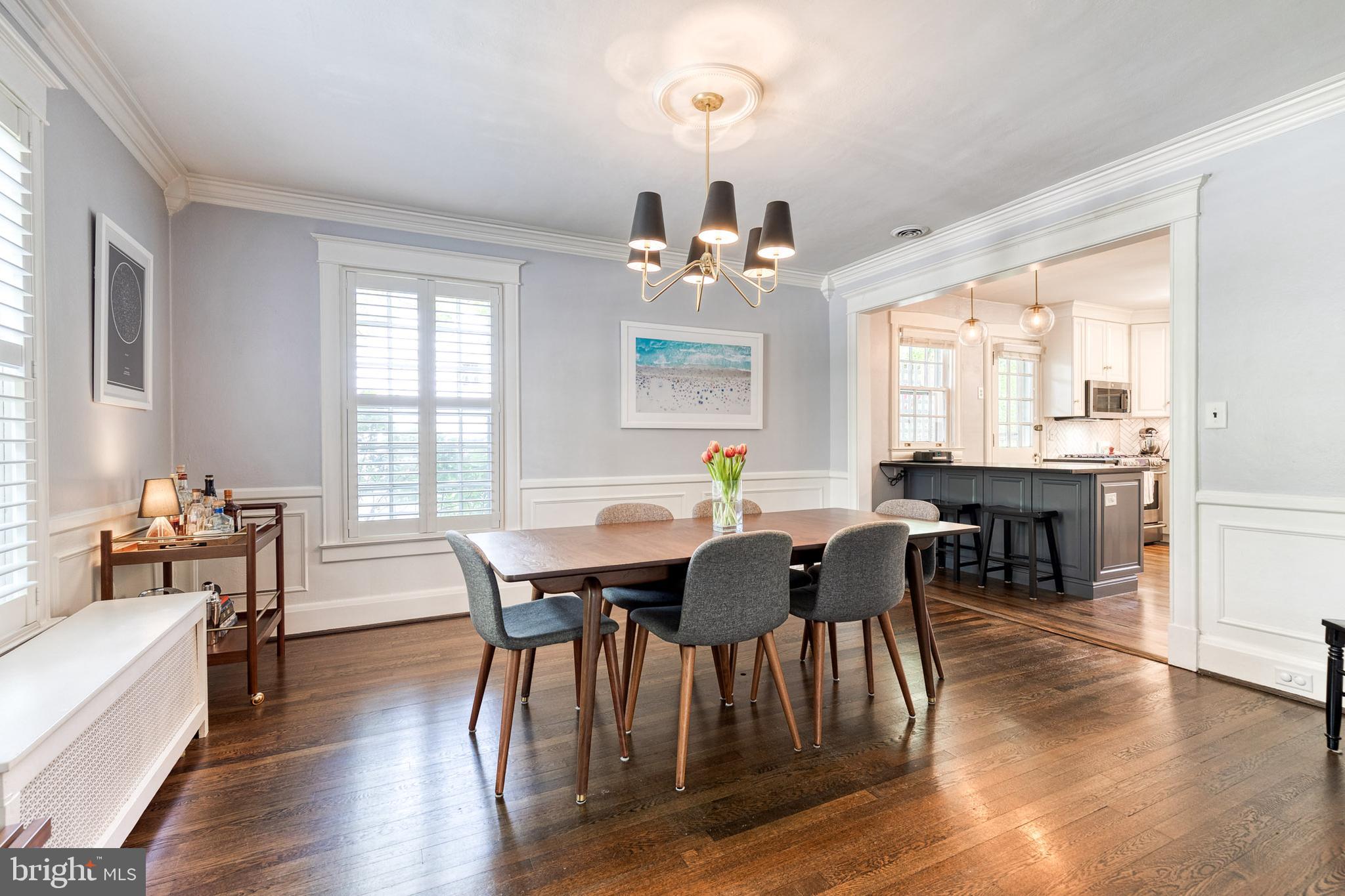 225 Tunbridge Road Baltimore, MD 21212 - Photo 24 of 65 a view of a dining room with furniture and wooden floor