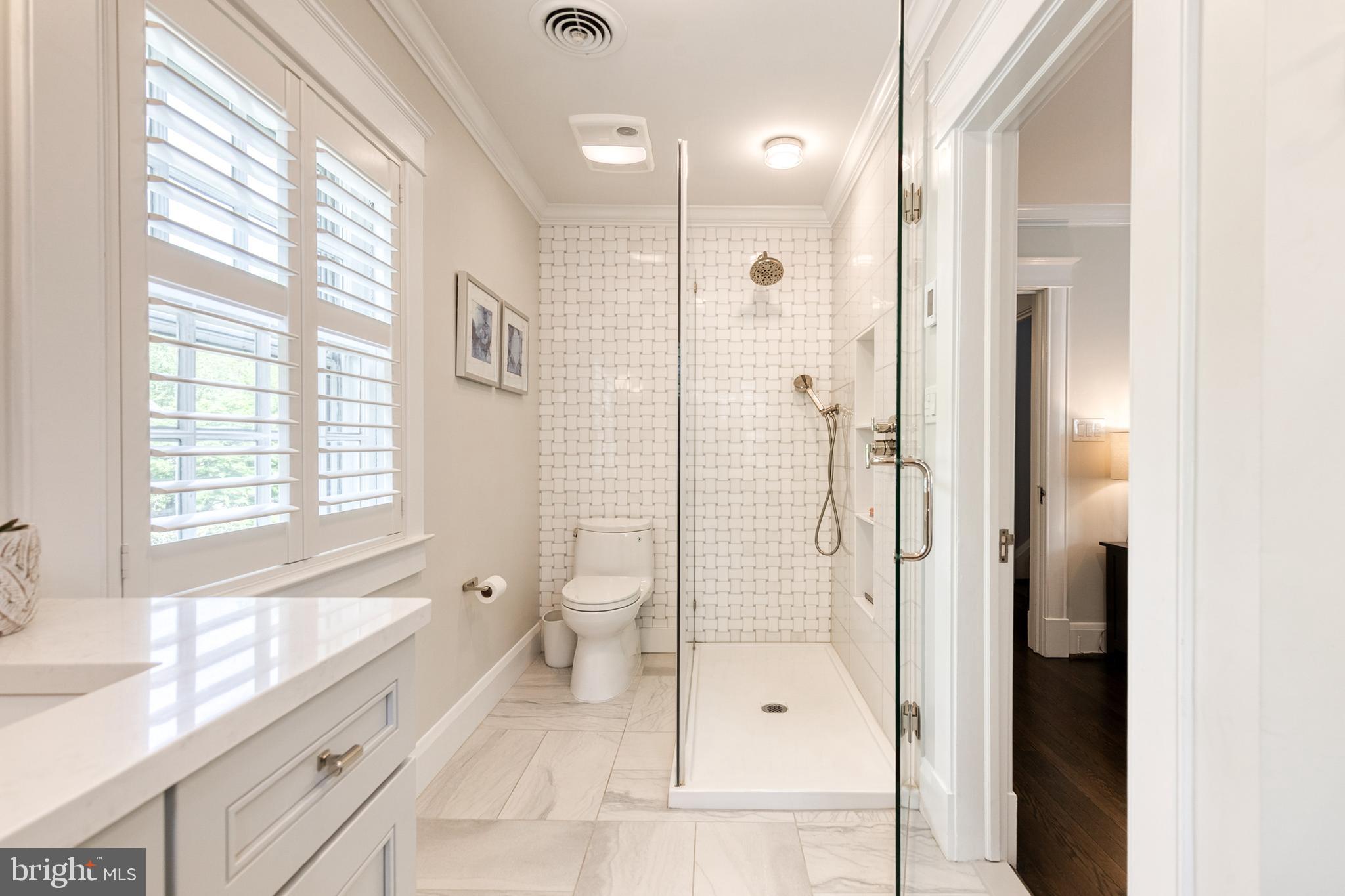 225 Tunbridge Road Baltimore, MD 21212 - Photo 38 of 65 a bathroom with a granite countertop tub shower and sink