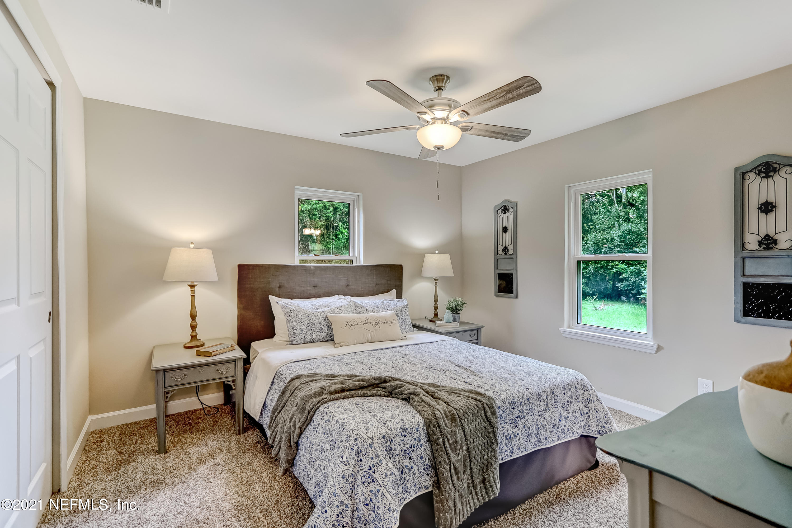 1416 Fred Gray Road Jacksonville, FL 32218 - Photo 28 of 34 a bedroom with a bed and a window
