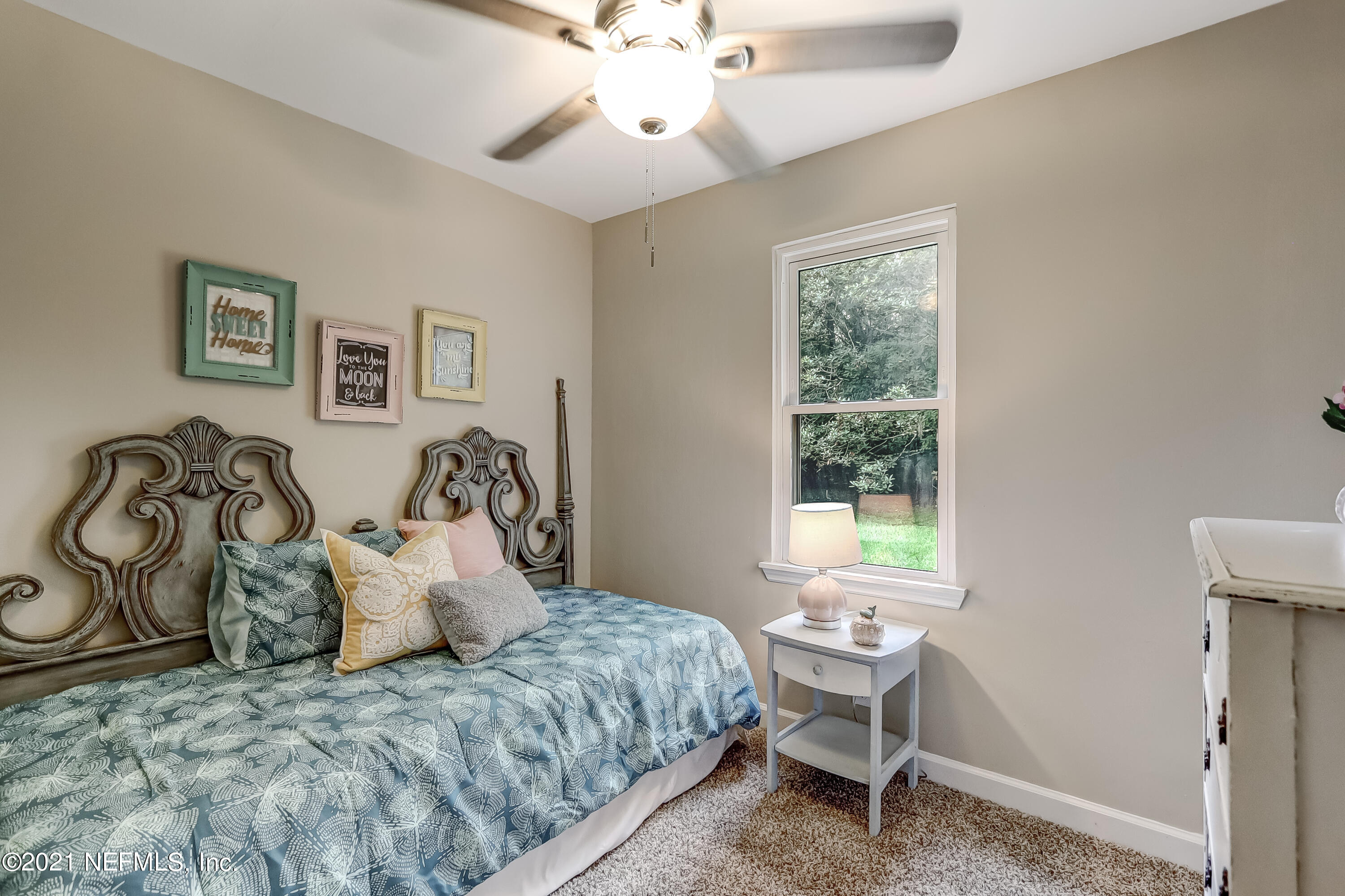 1416 Fred Gray Road Jacksonville, FL 32218 - Photo 34 of 34 a bedroom with a bed and a window