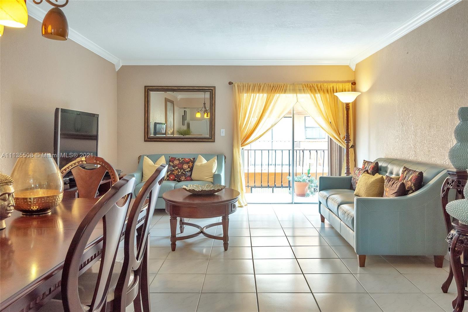 1900 West 54th Street, Unit 307 Hialeah, FL 33012 - Photo 11 of 49 a living room with furniture and a window