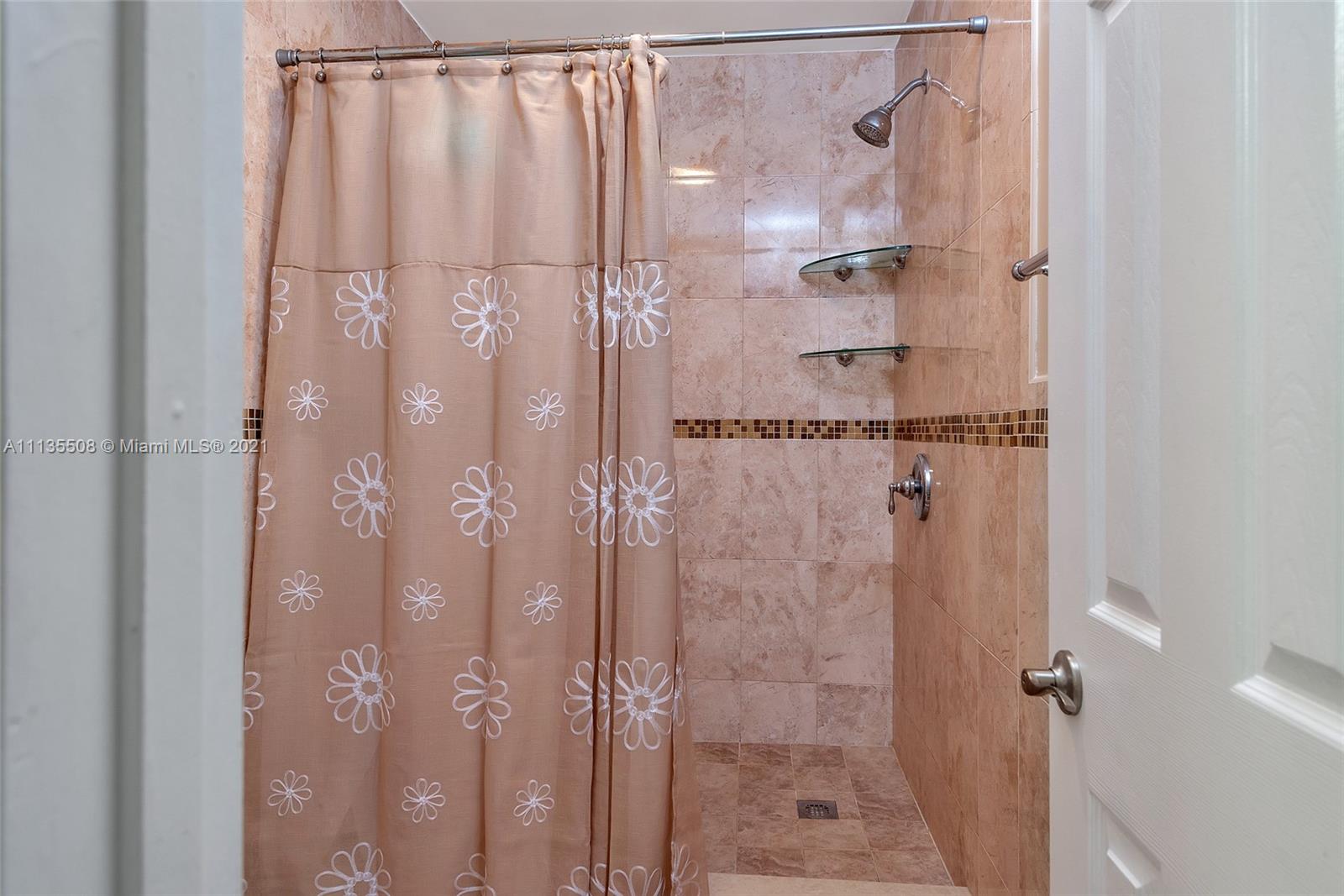 1900 West 54th Street, Unit 307 Hialeah, FL 33012 - Photo 38 of 49 a bathroom with a shower
