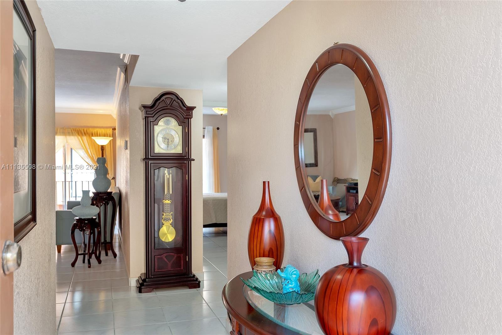 1900 West 54th Street, Unit 307 Hialeah, FL 33012 - Photo 7 of 49 a front view of a house with garden