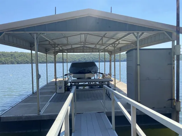 a view of a balcony with chairs