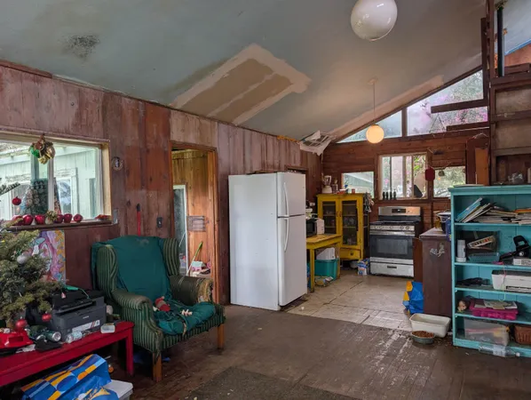 a store room with lots of furniture and clutter