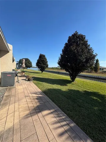 a view of a garden with an outdoor space