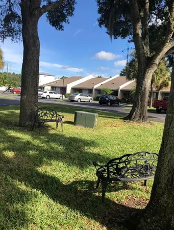 a view of a lake with a big yard