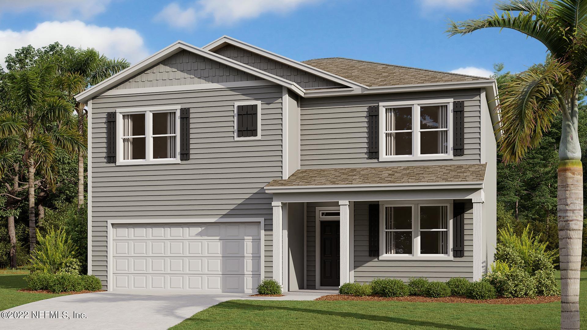211 Falcon Ridge Road St. Augustine, FL 32084 - Photo 1 of 18 a front view of a house with a yard
