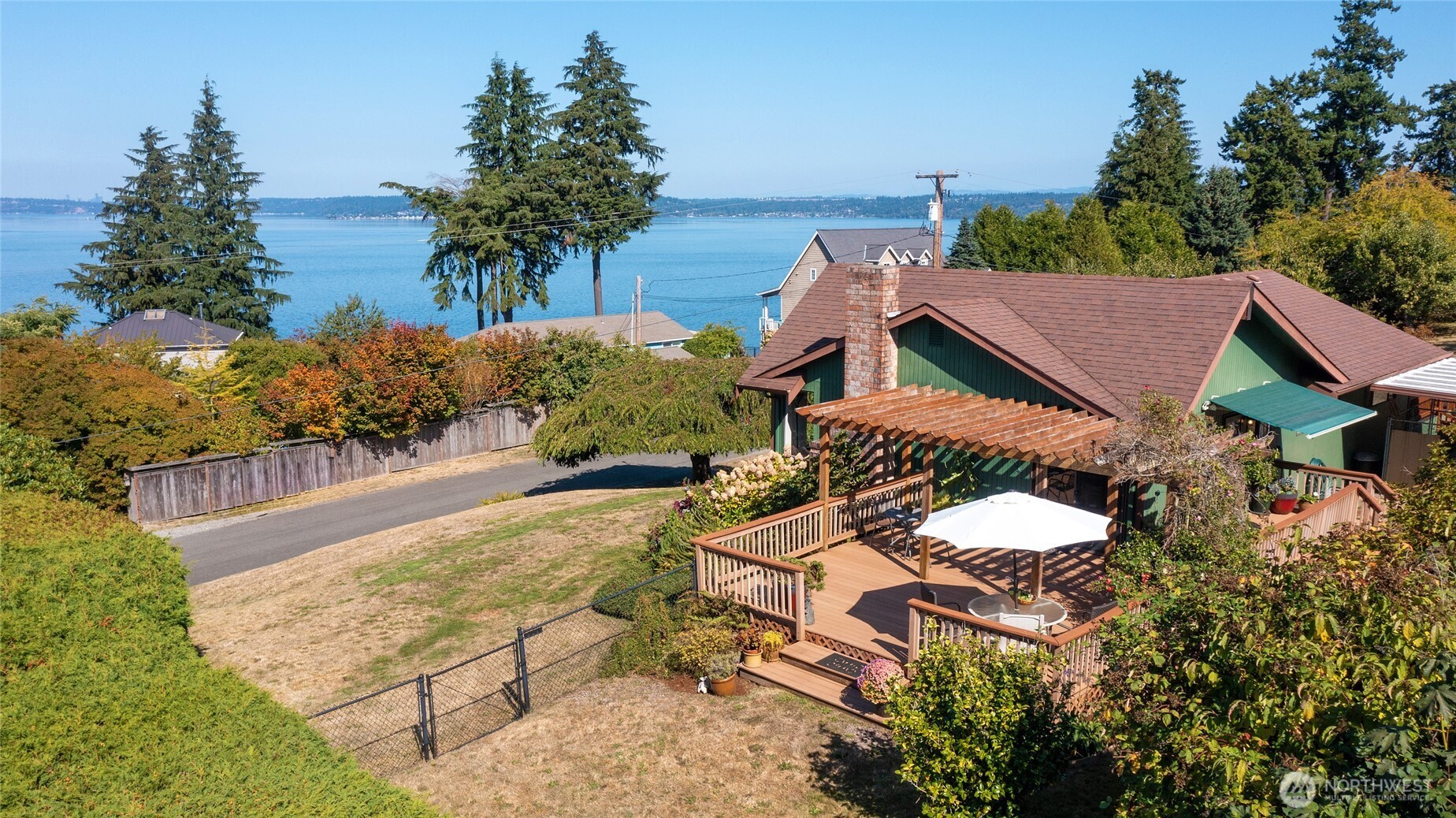 6809 Southwest Maury Park Road Vashon, WA 98070 - Photo 1 of 37 a view of house with outdoor space and sitting area