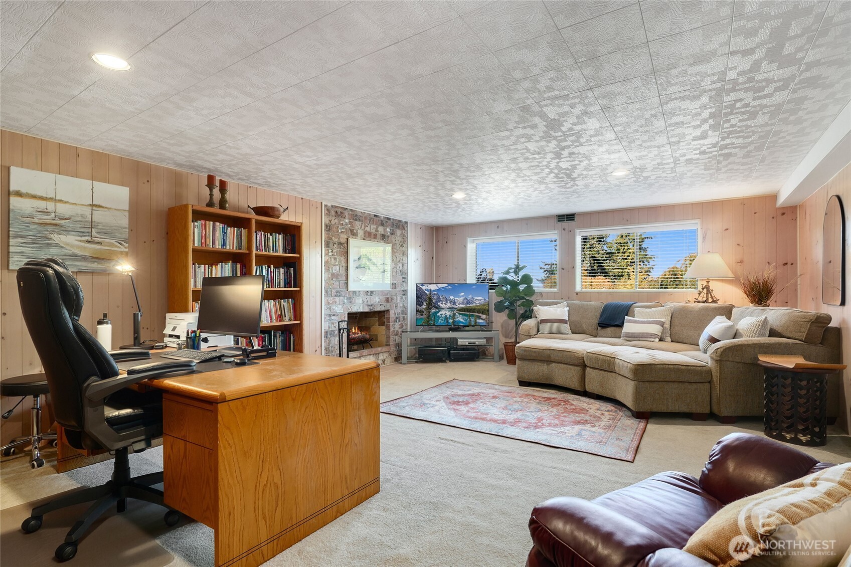 6809 Southwest Maury Park Road Vashon, WA 98070 - Photo 22 of 37 a view of a livingroom with workspace and a couch