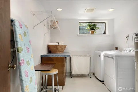 a view of kitchen with furniture and a window