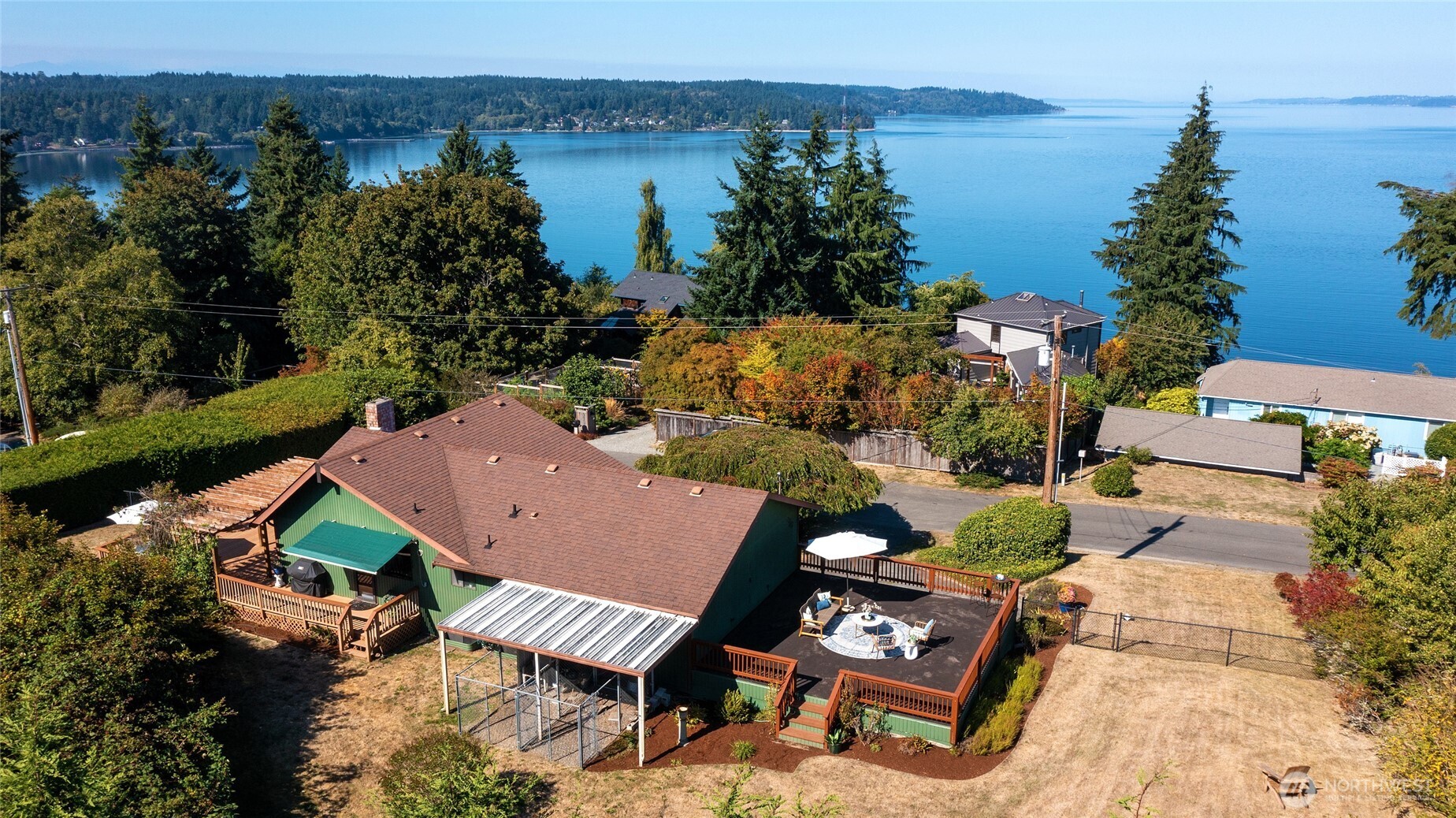 6809 Southwest Maury Park Road Vashon, WA 98070 - Photo 35 of 37 an aerial view of a house with garden space and lake view