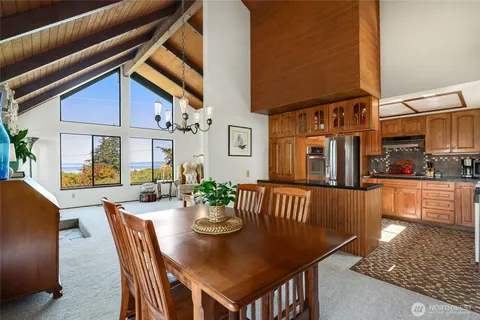 a view of a patio with a table and chairs
