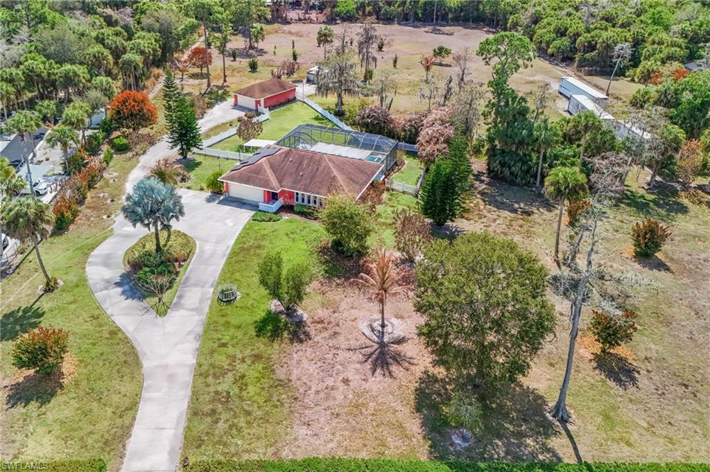 360 16th Avenue Northwest Naples, FL 34120 - Photo 25 of 25 an aerial view of residential houses with outdoor space