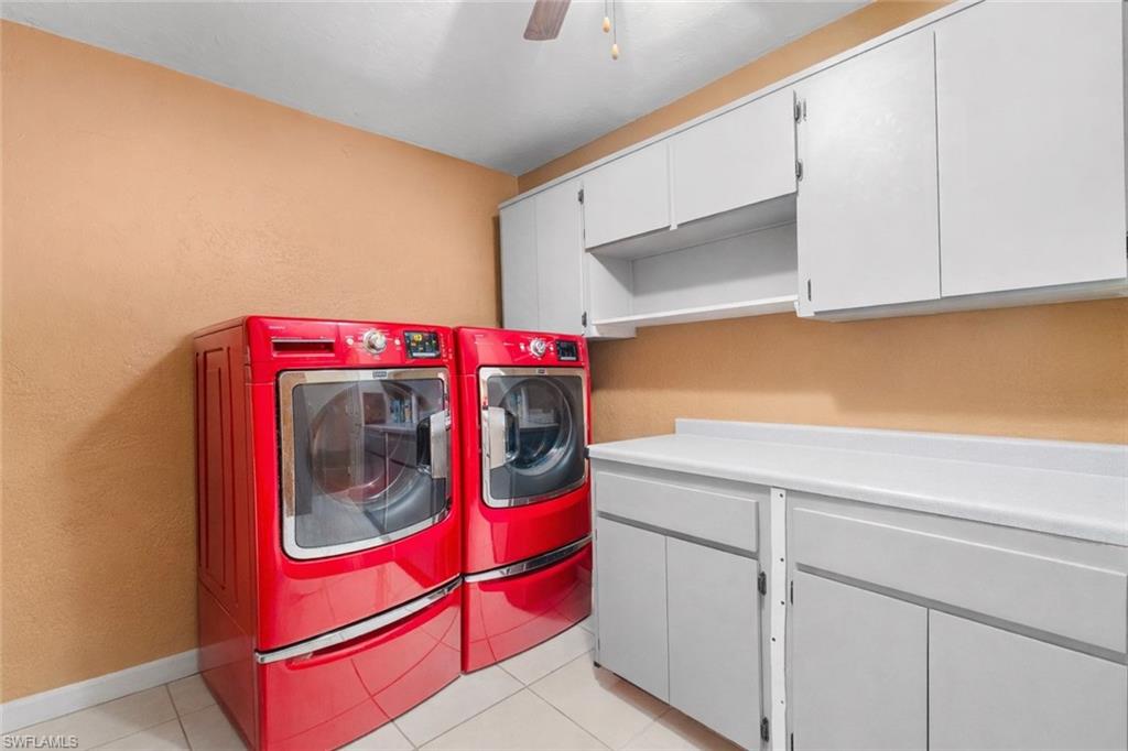 360 16th Avenue Northwest Naples, FL 34120 - Photo 4 of 25 a utility room with dryer and washer