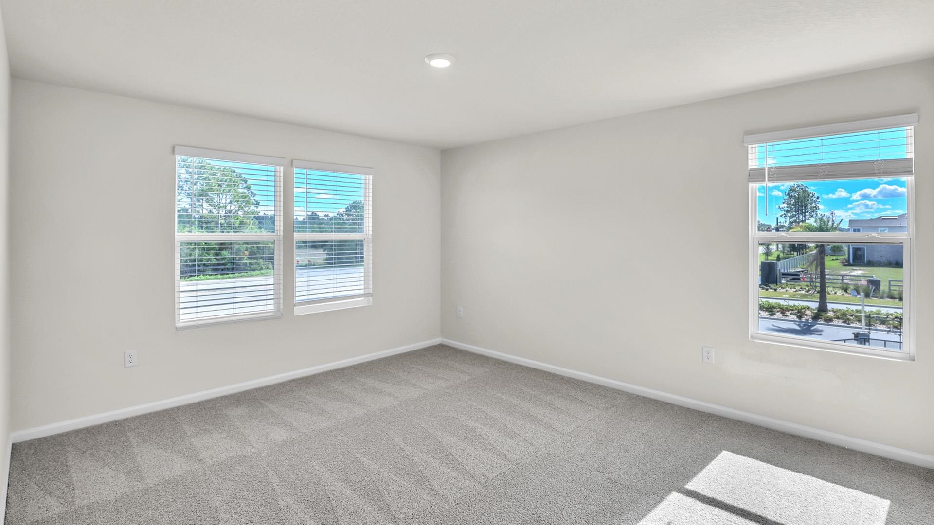 123 Redbud Road Palm Coast, FL 32137 - Photo 10 of 29 a view of an empty room with a window