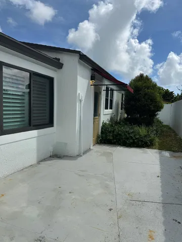 a view of a garden with a bench