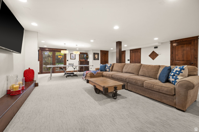 10280 Dimple Dell Road Sandy, UT 84092 - Photo 48 of 58 Living room with recessed lighting and light carpet