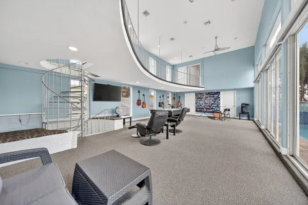 a view of swimming pool with a yard