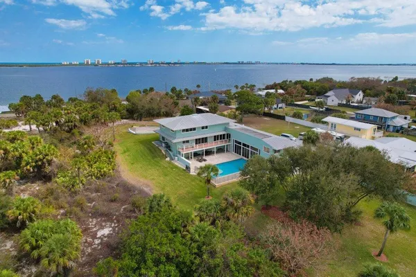 a view of lake and houses with outdoor space