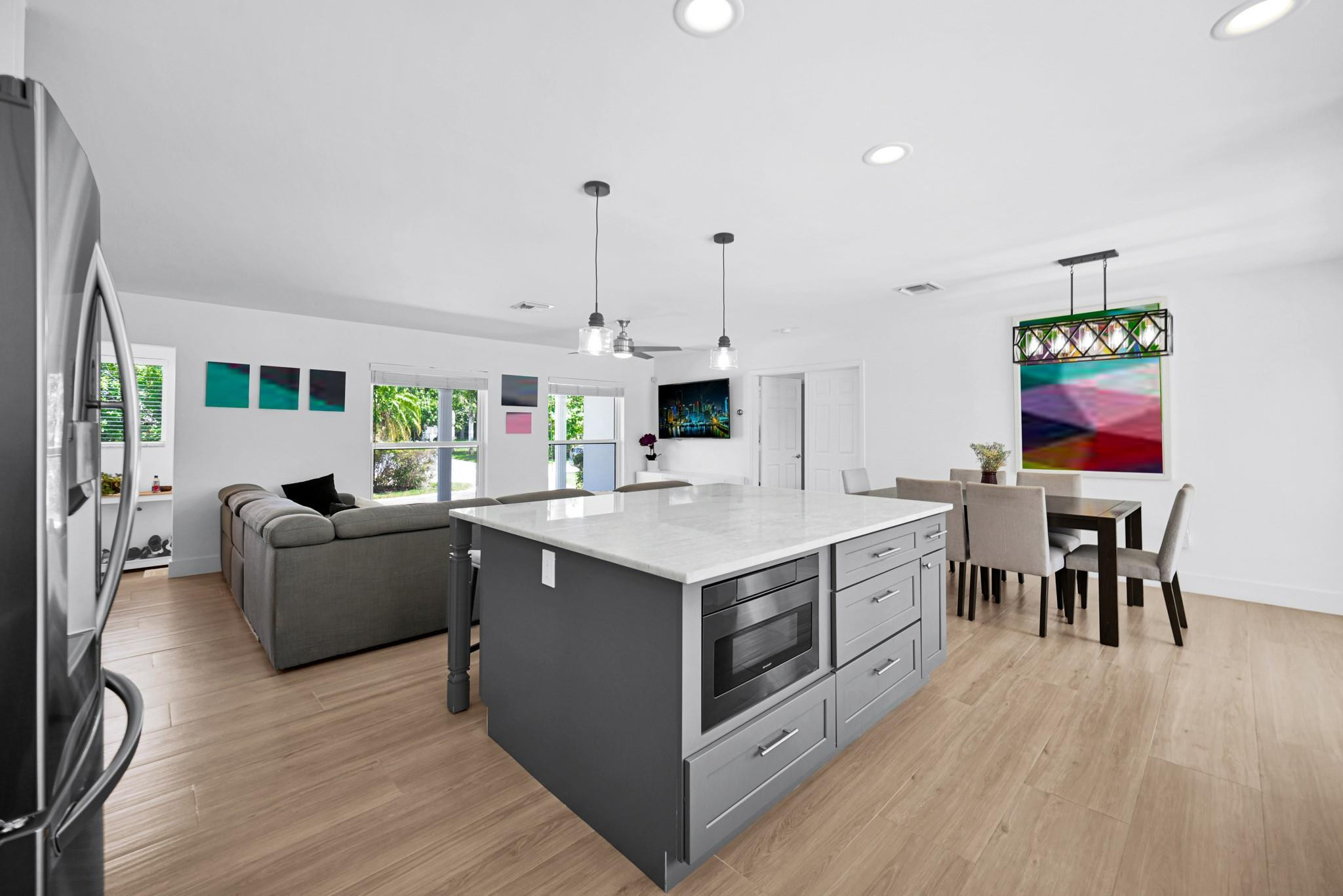 252 Southwest 14th Place Boca Raton, FL 33432 - Photo 14 of 49 a view of kitchen with microwave stove top oven and cabinets