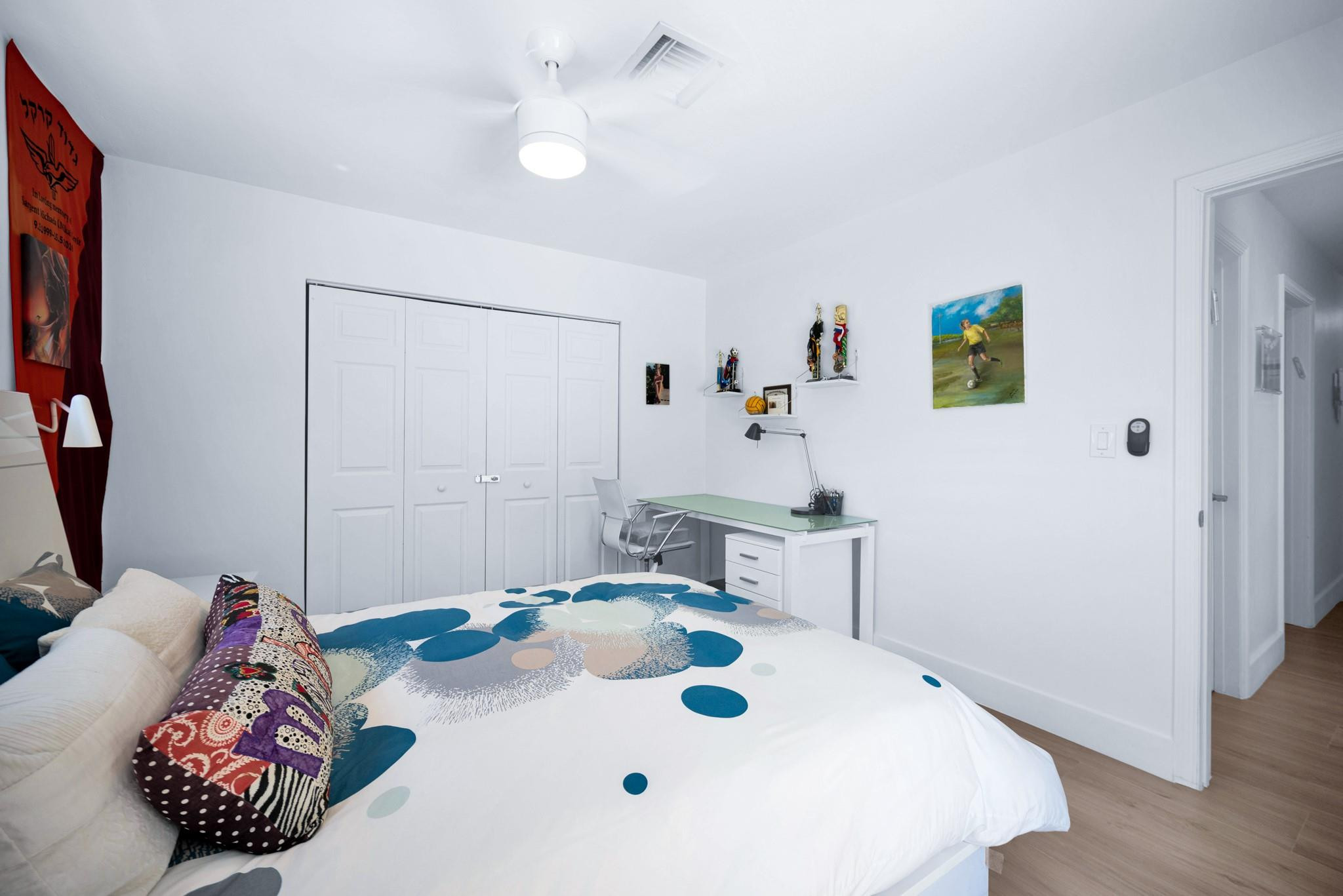 252 Southwest 14th Place Boca Raton, FL 33432 - Photo 26 of 49 a bathroom with a sink a mirror and a shower