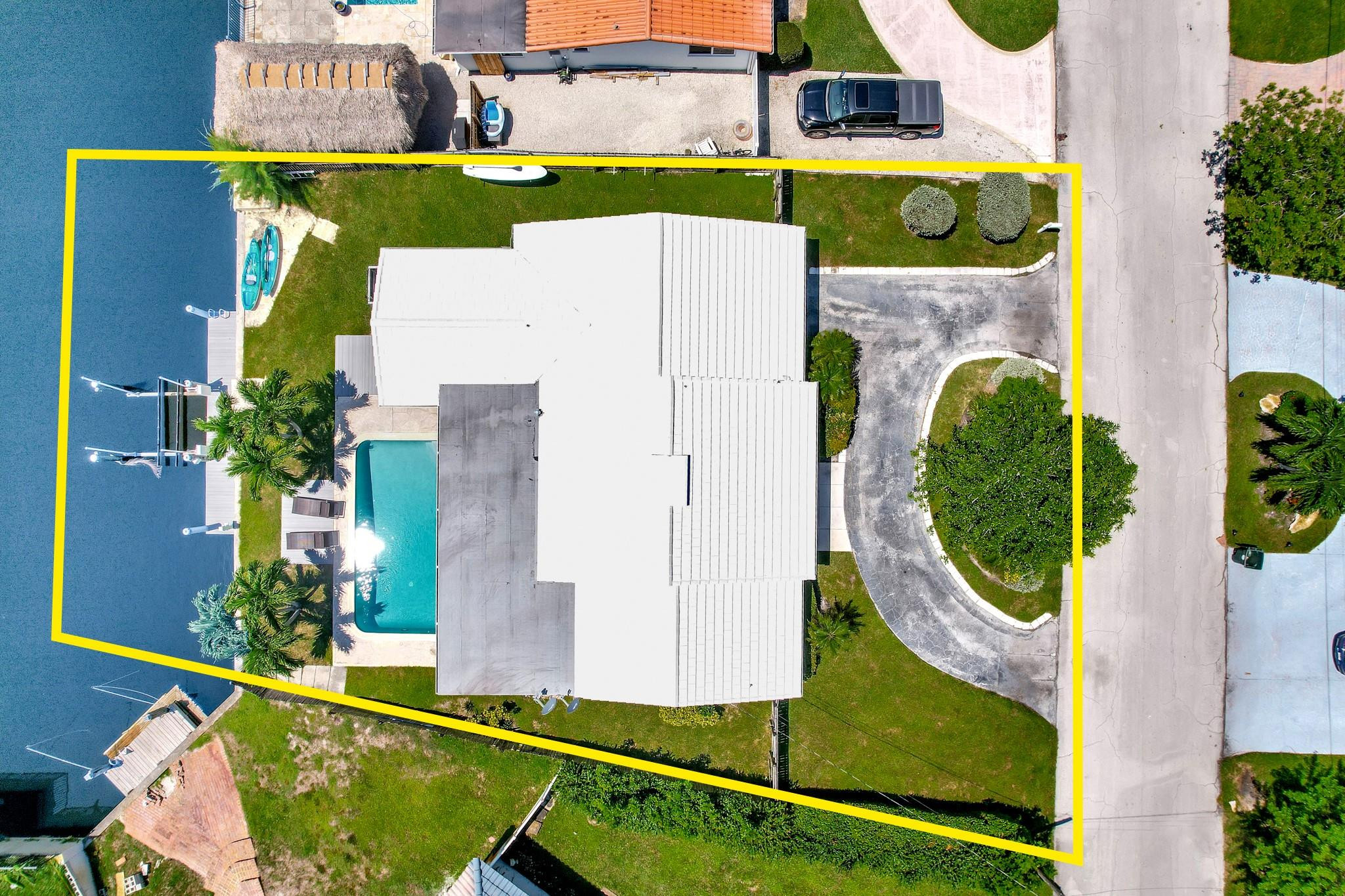 252 Southwest 14th Place Boca Raton, FL 33432 - Photo 3 of 49 an aerial view of a house with a swimming pool