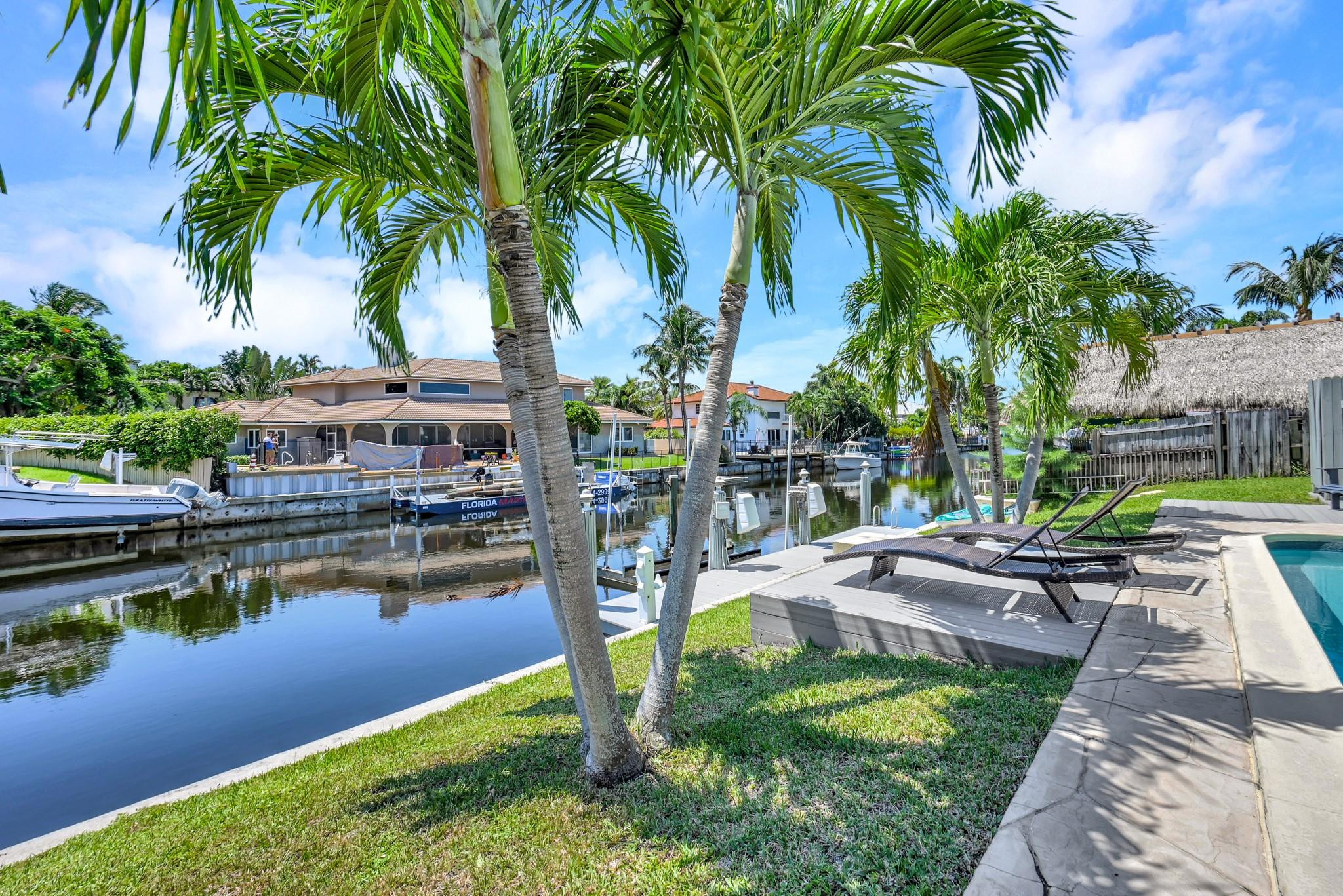 252 Southwest 14th Place Boca Raton, FL 33432 - Photo 30 of 49 a view of a garden with palm trees