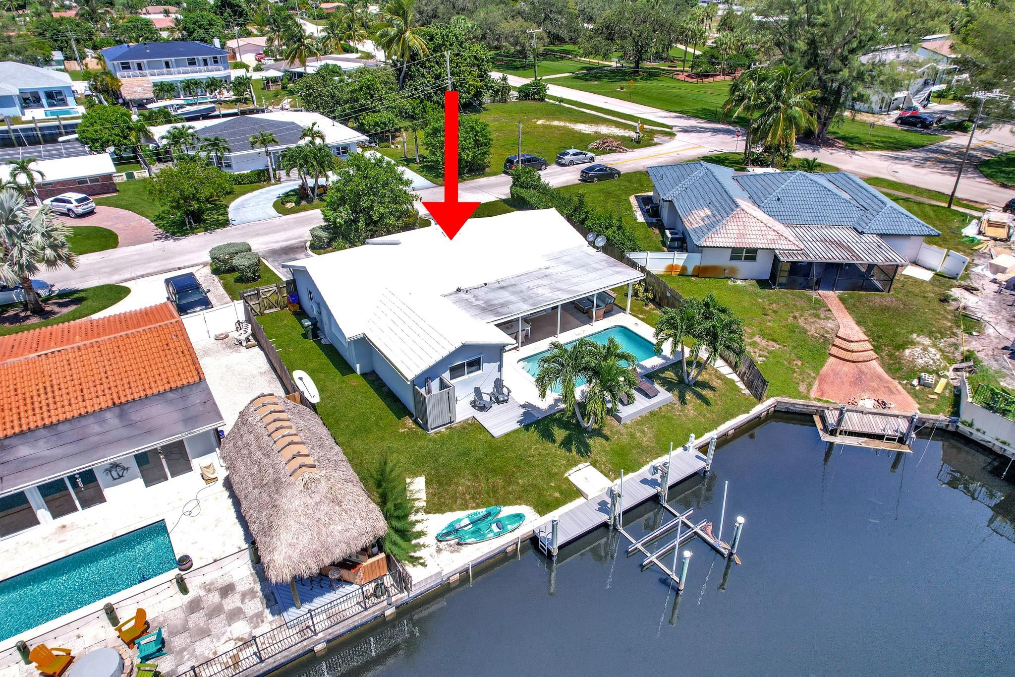 252 Southwest 14th Place Boca Raton, FL 33432 - Photo 45 of 49 an aerial view of a house with swimming pool patio and outdoor seating