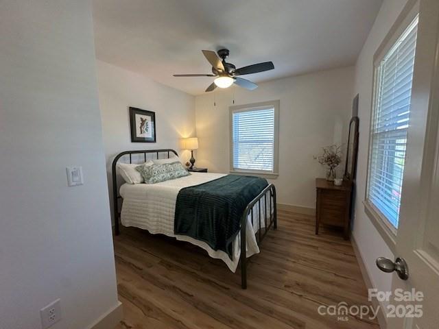 1224 Phillipsville Loop Canton, NC 28716 - Photo 16 of 22 a bedroom with a bed and a window
