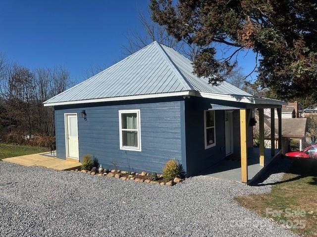 1224 Phillipsville Loop Canton, NC 28716 - Photo 3 of 22 a view of a house with a patio