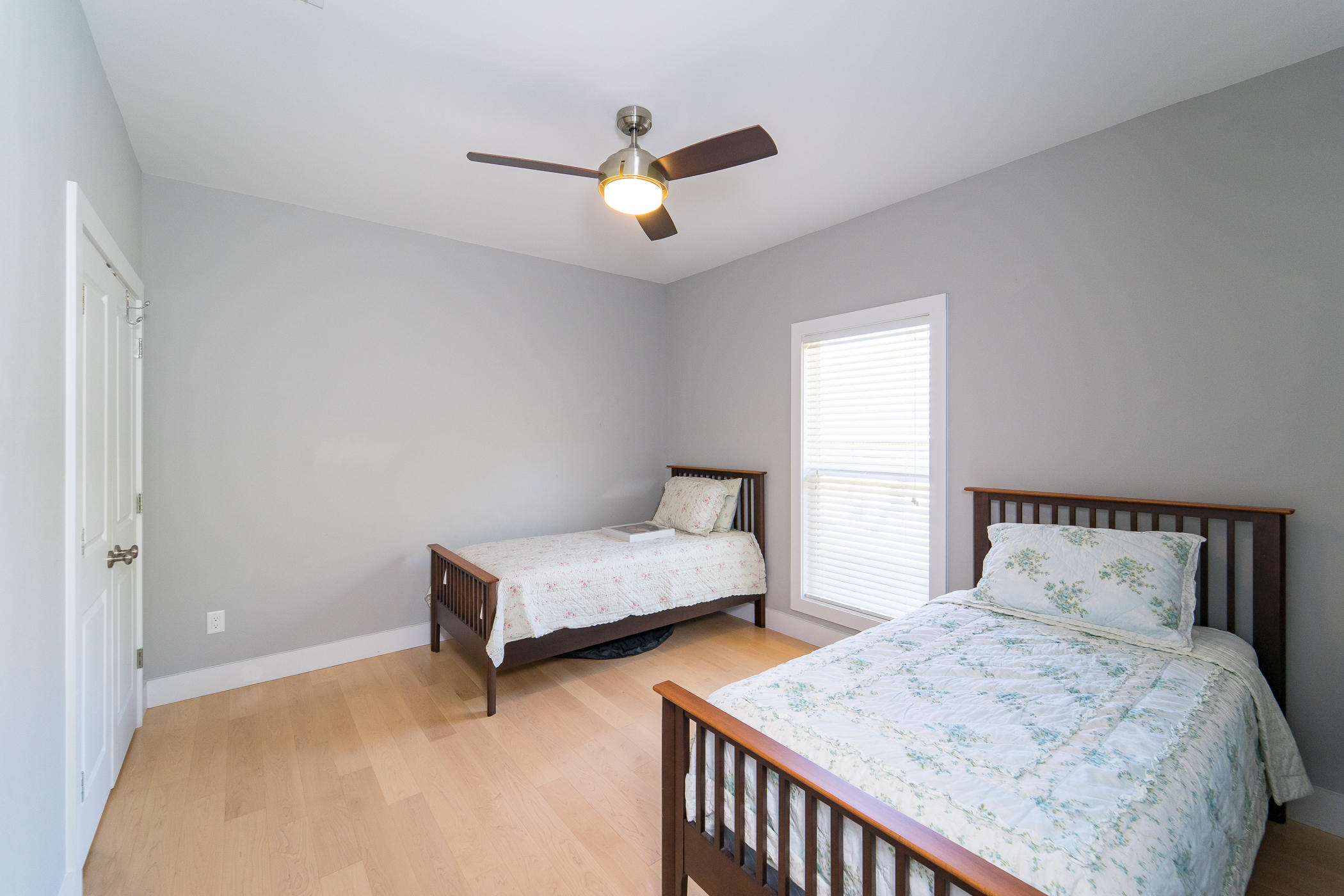 303 Greyfox Circle Crestview, FL 32536 - Photo 18 of 24 a bedroom with two beds and window