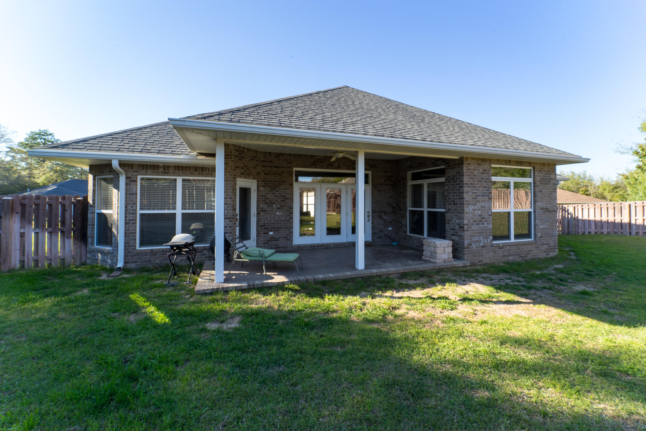 303 Greyfox Circle Crestview, FL 32536 - Photo 24 of 24 a view of a house with a yard and porch