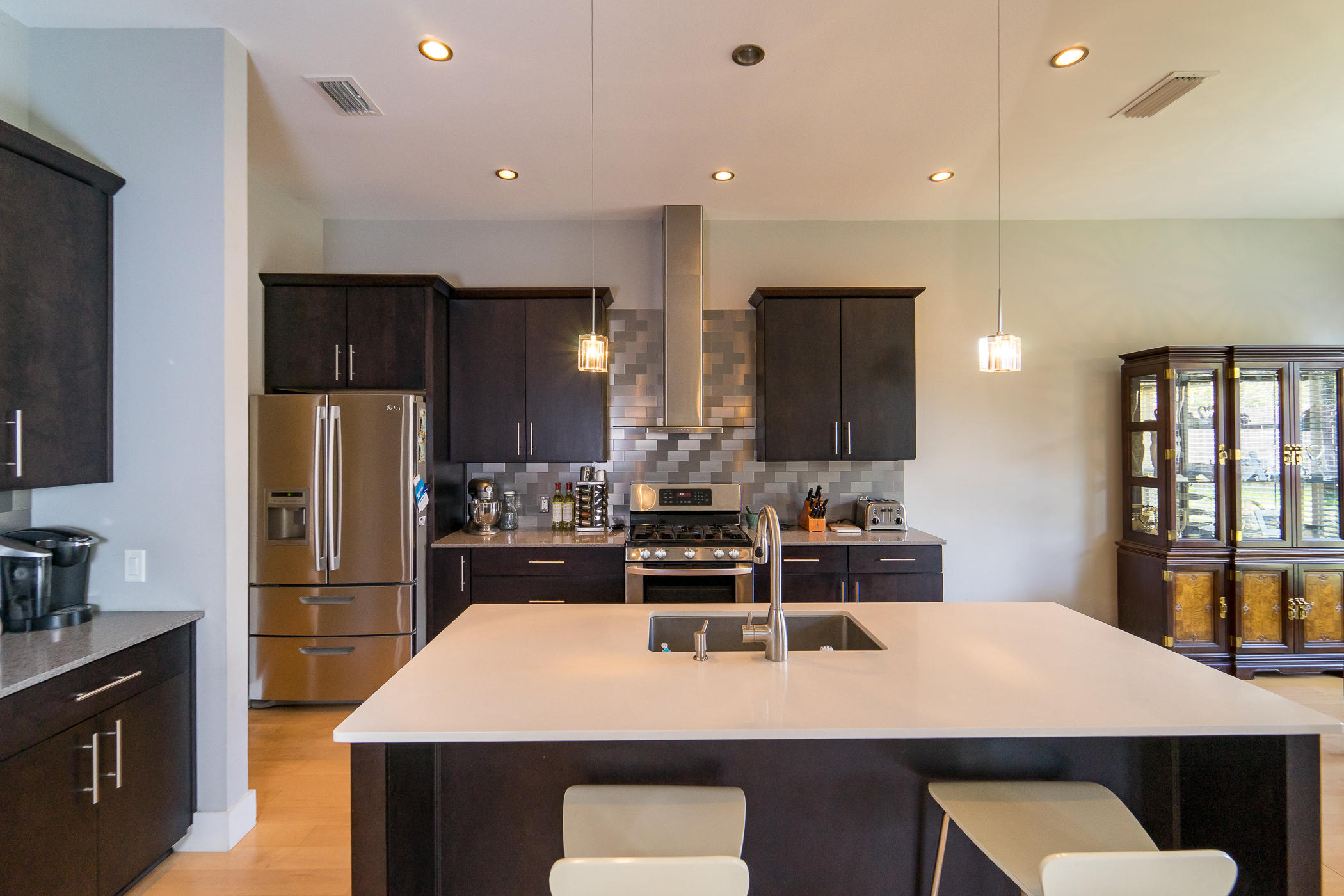303 Greyfox Circle Crestview, FL 32536 - Photo 6 of 24 a kitchen with counter and chairs