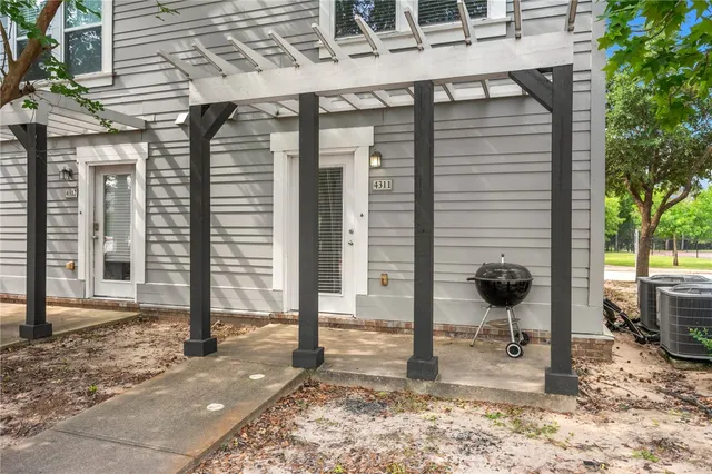 a view of a house with a door and a outdoor space