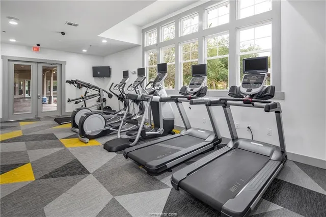 a view of a room with gym equipment