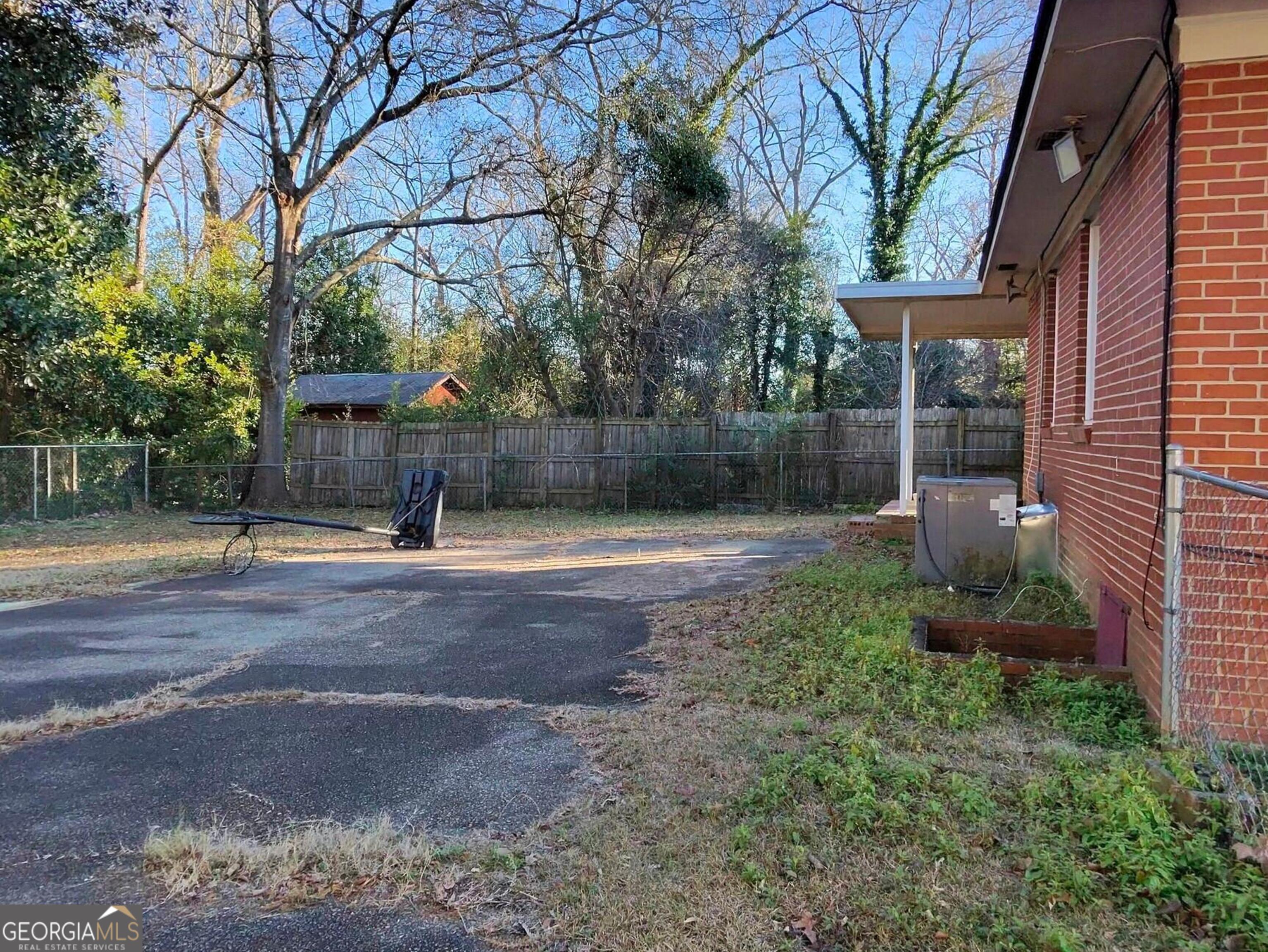 110 Lee Street Centerville, GA 31028 - Photo 13 of 16 a backyard of a house