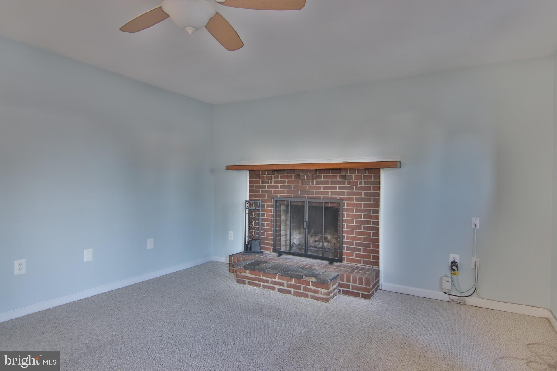1708 Severn Road Severn, MD 21144 - Photo 25 of 33 Apartment Living Room with Fireplace