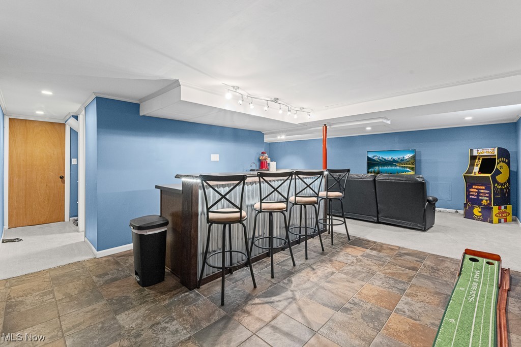 4000 Kenneth Road Stow, OH 44224 - Photo 38 of 50 Indoor dry bar featuring stone finish floors and recessed lighting