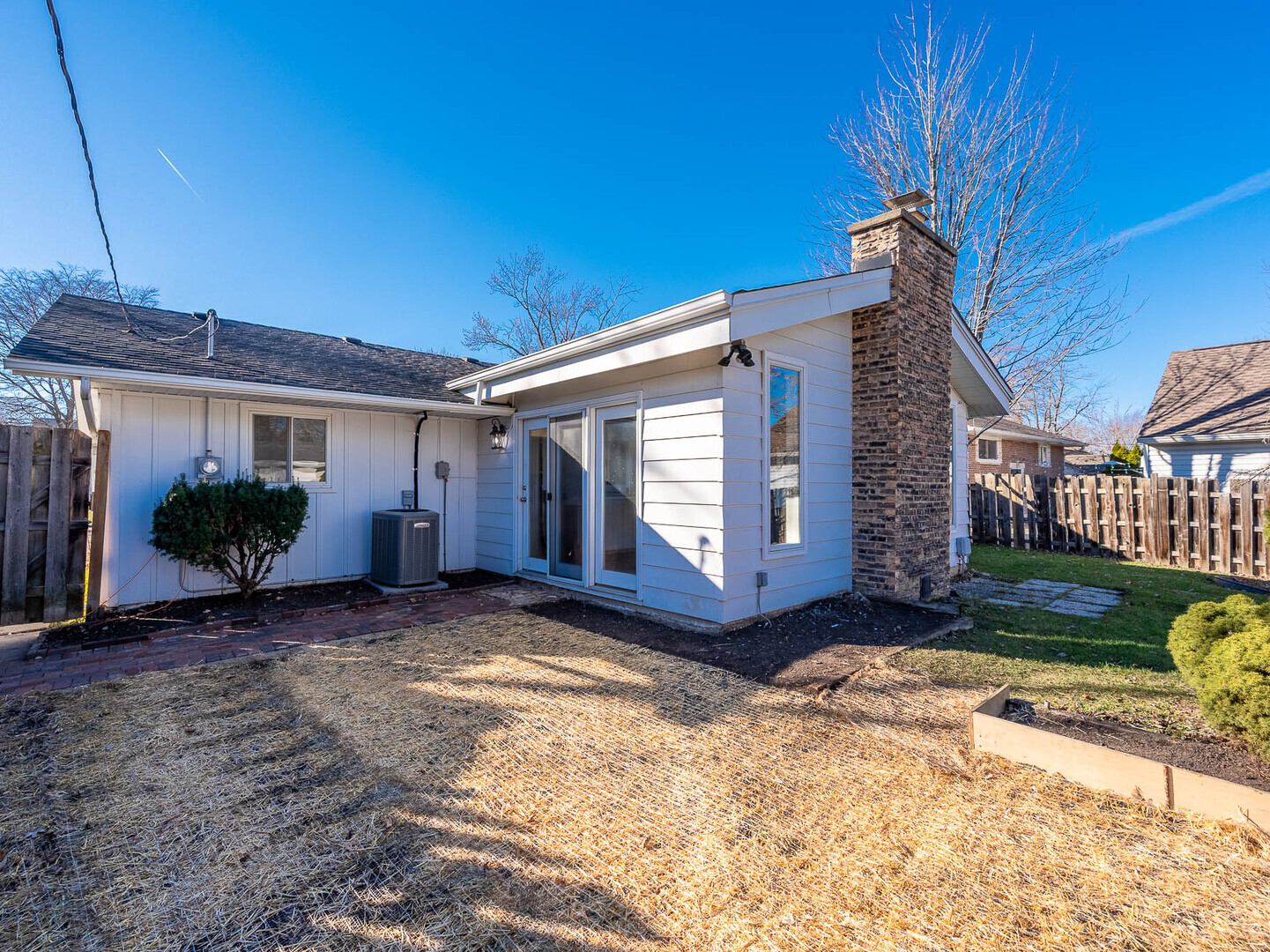 724 Surrey Drive Streamwood, IL 60107 - Photo 13 of 14 a view of a house with a yard
